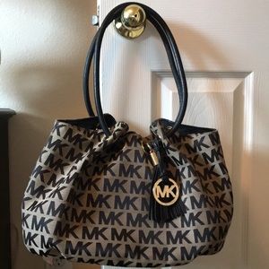 Michael Kors black and beige purse